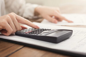 using calculator for Tax Service and Tax Preparation in Noblesville, IN