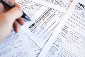 filing out paperwork for taxes and Tax Service and Tax Preparation in Westfield, IN